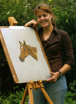 Hannah with one of her portraits.